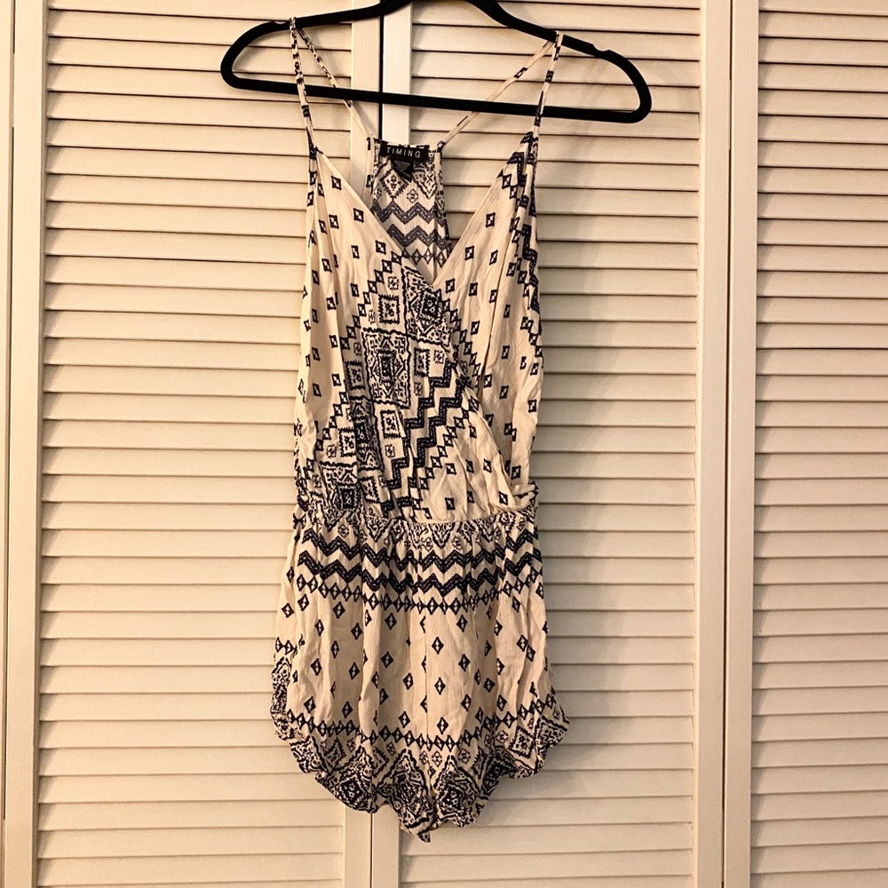 White romper with black design